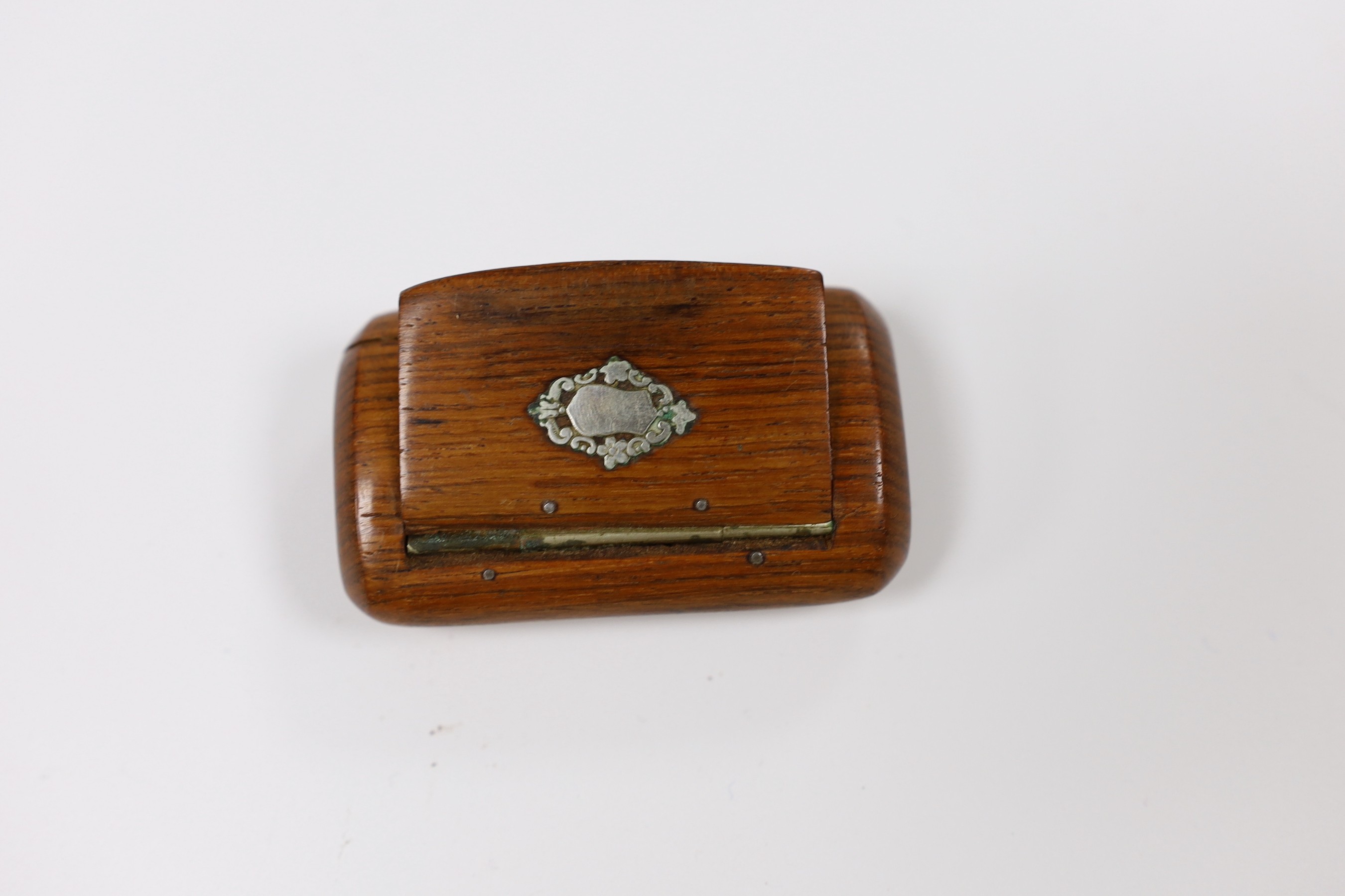 A 19th century French champleve enamel inkstand, 8.5cm tall, a brass snuff boot and two wood snuff boxes